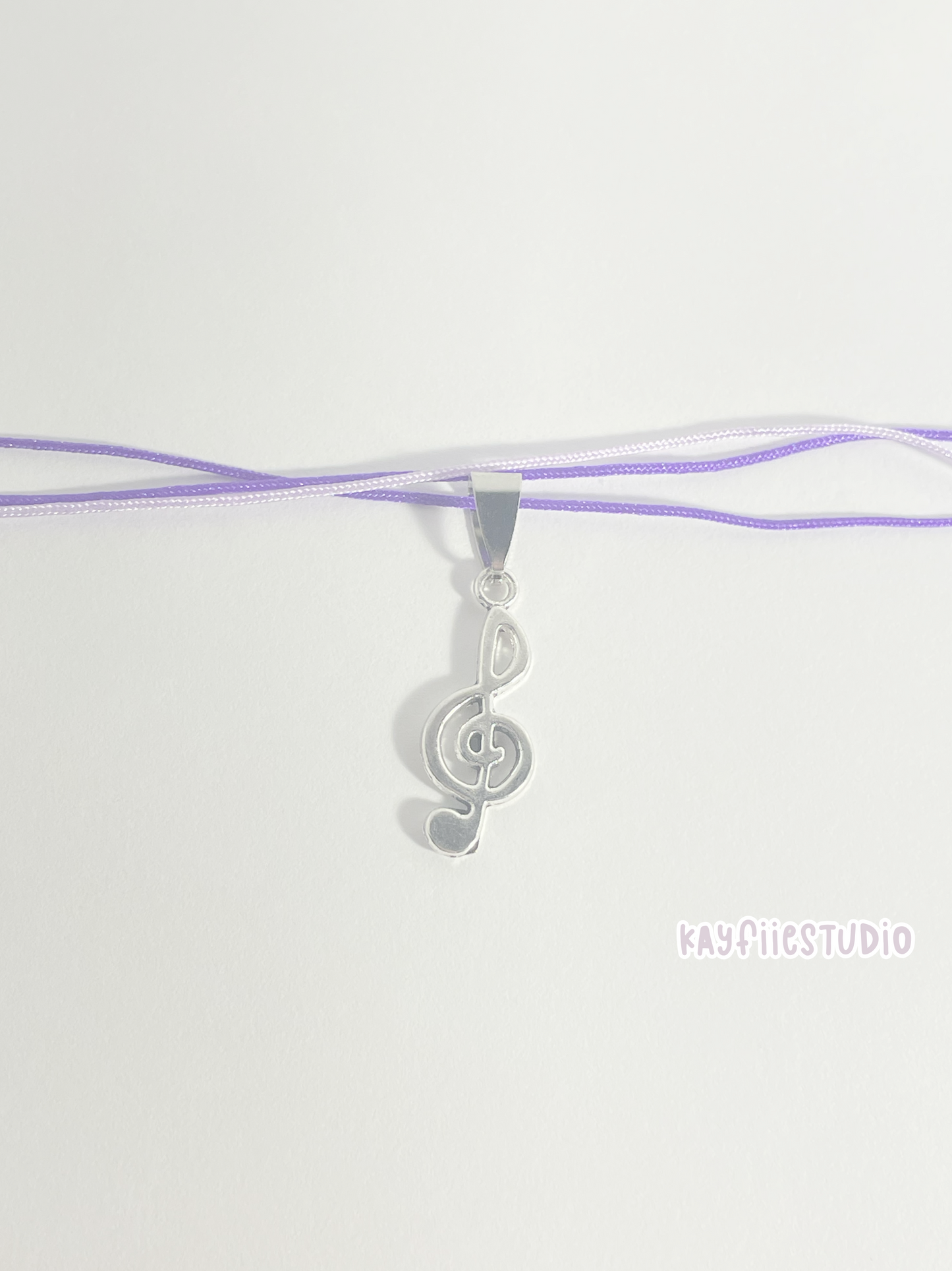 Musical note cord necklace