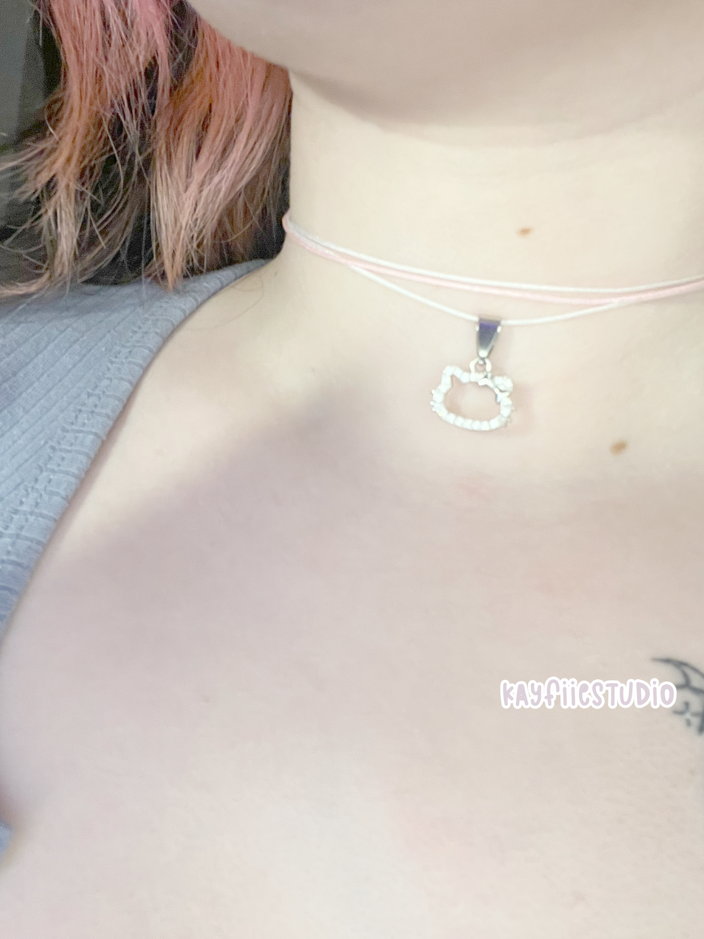 Hello kitty cord necklace